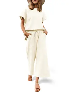 Fisoew Womens 2 Piece Outfits Sweatsuit Short Sleeve Tops and Drawstring Waist Cropped Wide Leg Pants Loungewear Sets