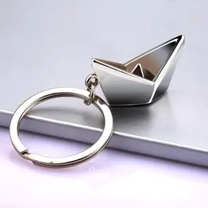 Stainless Steel Boat Keychain - Realistic Metal Ship Design, Foldable Craft, Smooth Sailing Good Luck Symbol, Ideal Gift for Key Accessory Enthusiasts