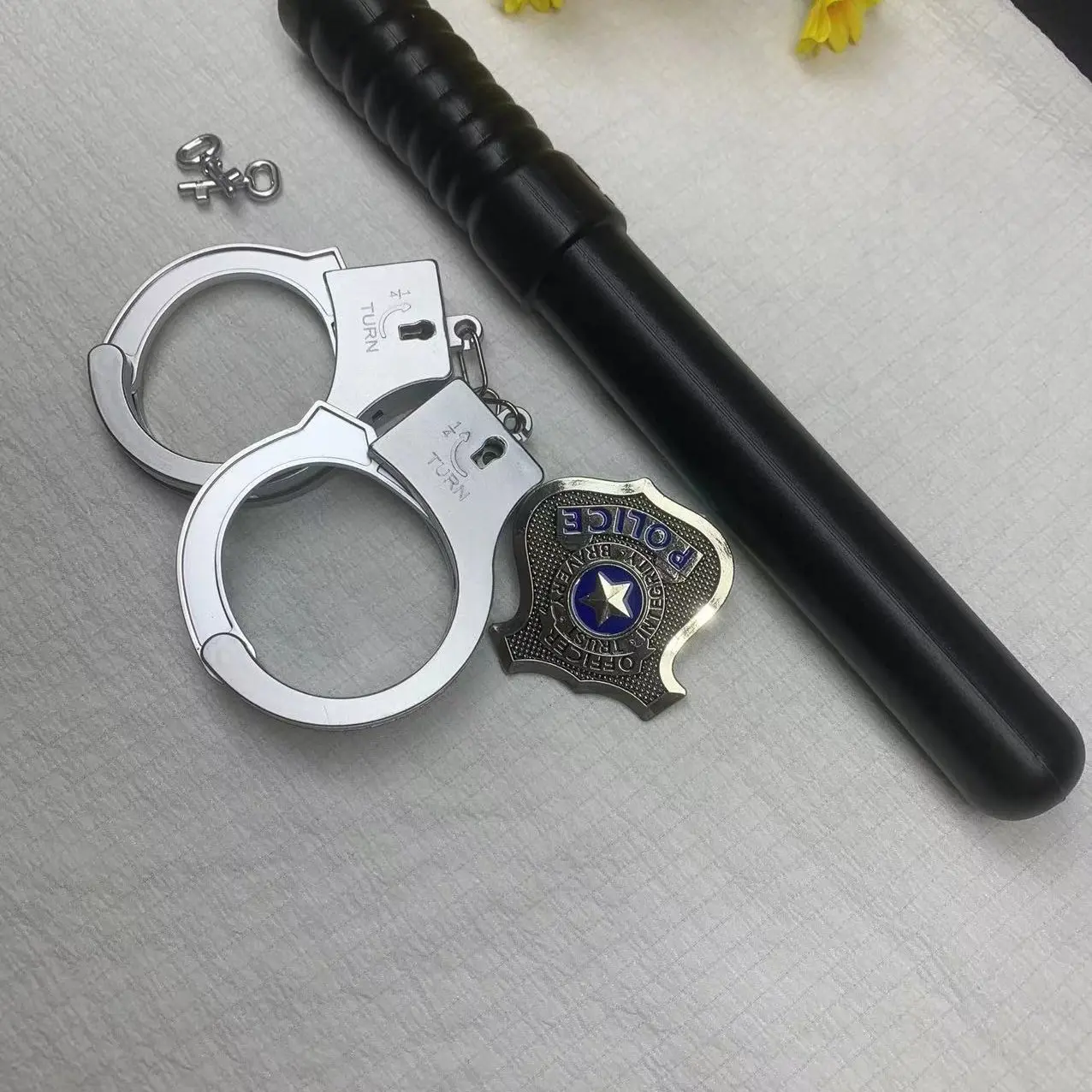 Three-Piece Toy Handcuffs Set with Baton and Badge, Police Role-Play Accessories, Fun Kids' Playset for Pretend Games