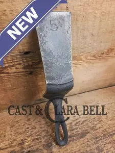 Custom made one of a kind 1940's Era Lodge repurposed spatula.  Turned an ordinary cracked skillet into a grill helper! SC24