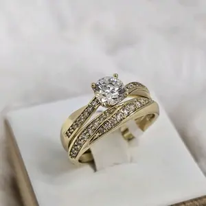 Elegant Gold Tone Ring with Round Center Stone and Sparkling Side Stones for Women's Jewelry