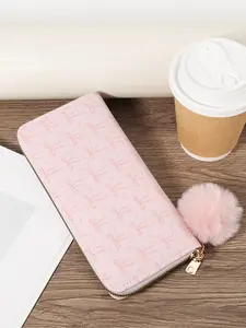 Ladies' Butterfly Knot Printed Flower Long Wallet - With a Pom pom Charm, a stylish clutch wallet with a secure zipper, multiple card slots, and hair clips