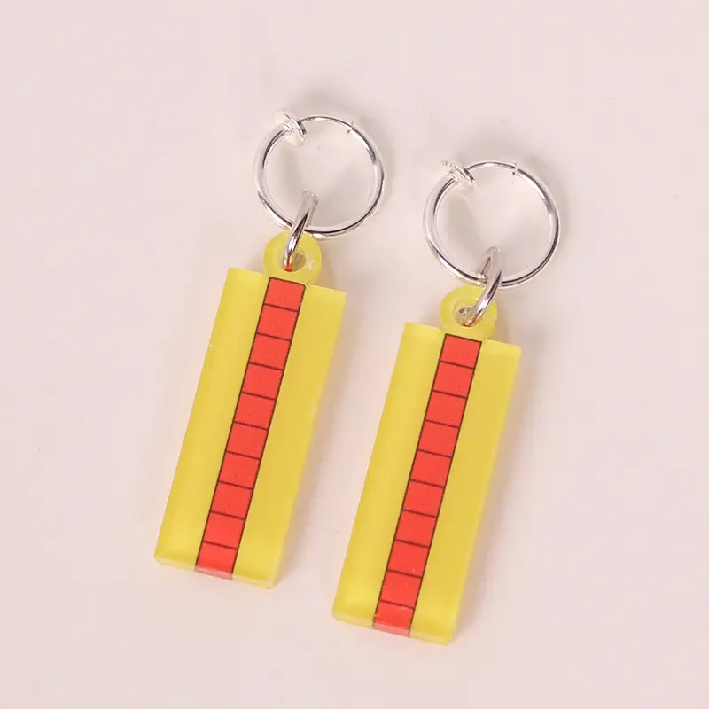 A pair of rare Saki iron ear clips