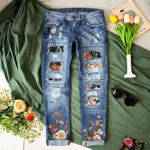 Vintage washed flower embroidered denim pants with holes and flower decals - Valentine's Day slim fit jeans with unique design detailsRAIMENTRY