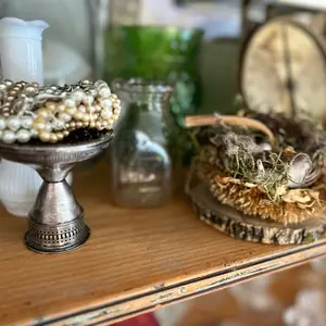 Vintage upcycled pearl jewelry Bird Nest on antique silver candlestick