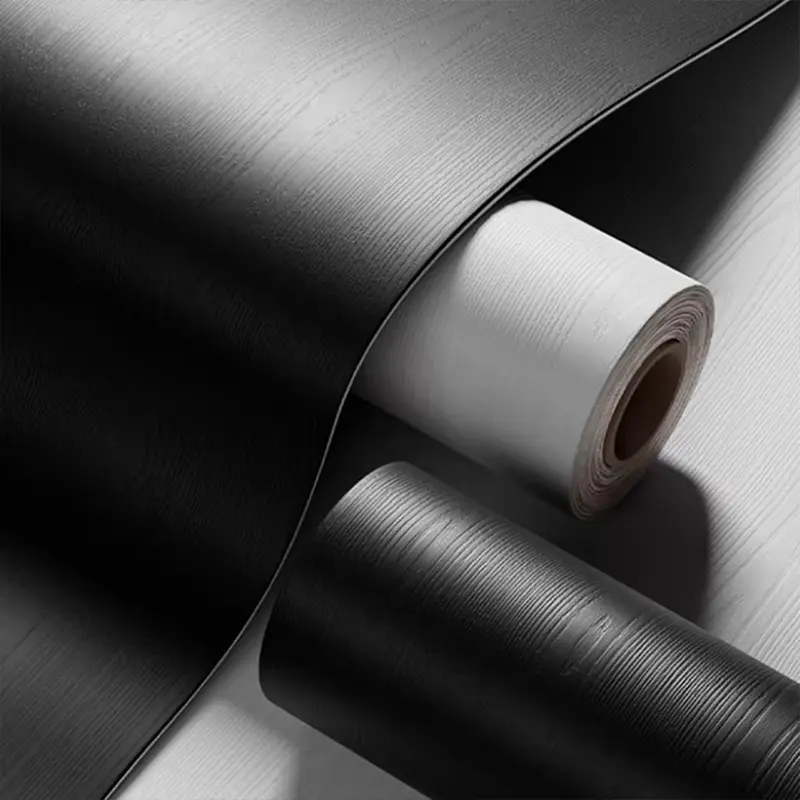 A roll of black wood grain stickers, waterproof and oil-proof vinyl film, suitable for kitchen, bathroom, furniture renovation, easy to paste and remove, modern hollow pattern, semi-gloss, self-adhesive, reusable PVC material