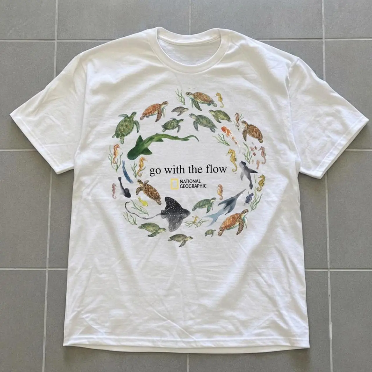 National Geographic Marine Life Circle Graphic Tee - "Go With The Flow" Sea Turtle Ocean T-Shirt Unisex White Short Sleeve Cotton Top