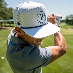 White 6 Panel Golf Hat with Navy Blue Rope Breathable Perforated Design & Adjustable Snapback Closure featuring Tee Hole and Texas Logo