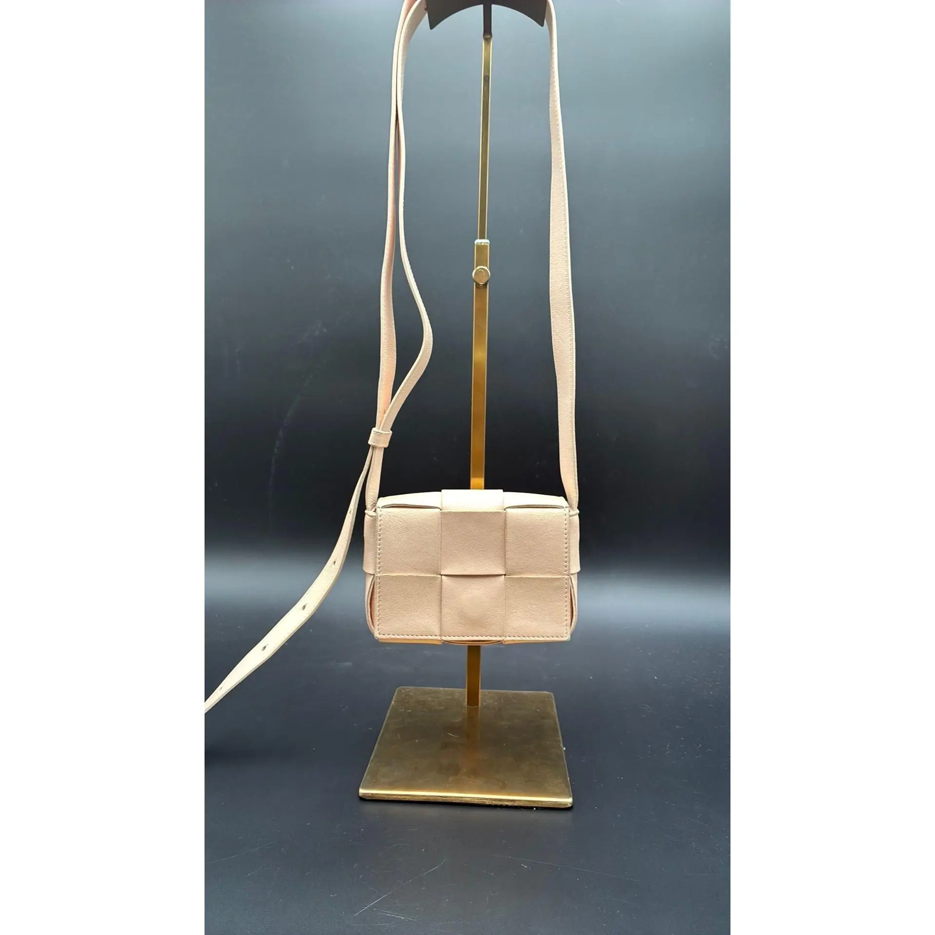 Pre-owned Leather Luxury Bags & Accessories Bottega Veneta Mini Cassette Intrecciato Bag, Beige Date Code: MCCHP07102601. Entrupy ID: MGBX3YB.