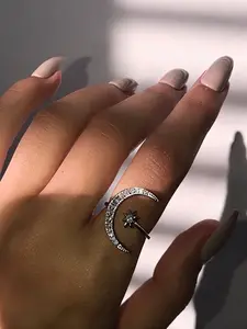This stylish crescent-shaped ring, Adjustable ring, with moon and sun design, inlaid with rhinestones and featuring an open design, is perfect for parties, evening wear, and photoshoots, a women's accessory and gift for women