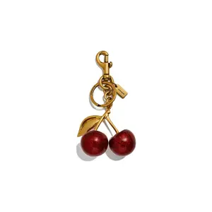 Coach Cherry Bag Charm for Women – Resin and Metal Handbag Accessory in Red and Gold