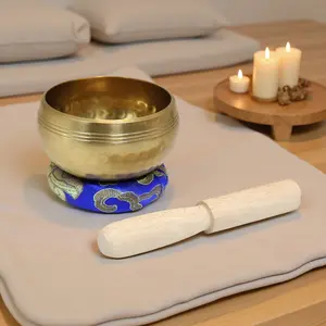 A 3.8 inch Singing Bowl， Gong Bowl, Nepalese-style brass, hand-forged, with a bright and ethereal tone, ideal for yoga, meditation, and mood adjustment. Includes a mallet and washer