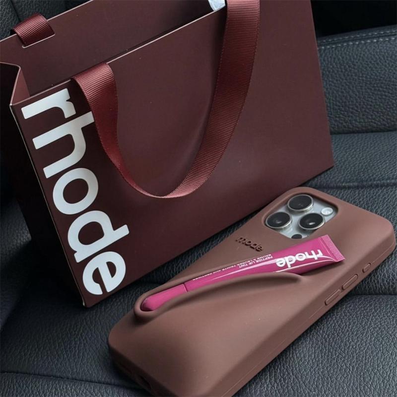 Silicone Phone Case with Integrated Lip Balm Slot for Rhode Peptide Lip Treatment.