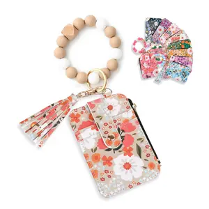 Women Boho Beaded Wallet Keychain Wristlet Wallet for Women Tassel Silicone Keychain Card Holder Small Purse Gifts