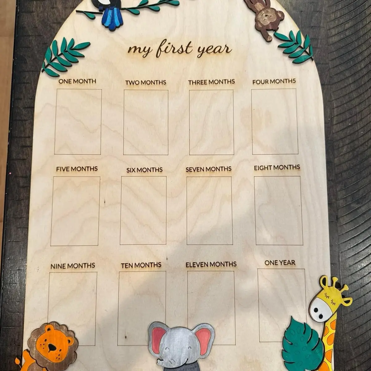 Birthday milestone boards. Place pictures from birth to age one to make a cute birthday centerpiece. These are hand made per order. The are made from real wood and include your child’s name, a theme of your choice, and picture slots