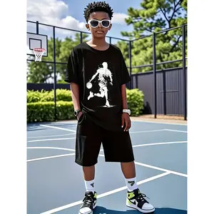 Stylish Black Basketball-Themed Boys' T-Shirt Featuring a Dynamic Dribbling Player Design. A Must-Have for Outdoor Courts, It Comes with Trendy White Accents And Offers a Comfortable Fit That Pairs Well with Matching Black Shorts