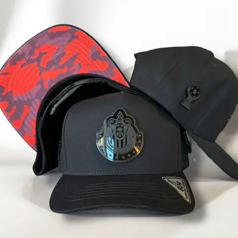 Chivas Snapback Cap for Fans Adjustable Performance Black Front Camouflage Design with Official Chivas Logo Hat for Game Day & Everyday Wear