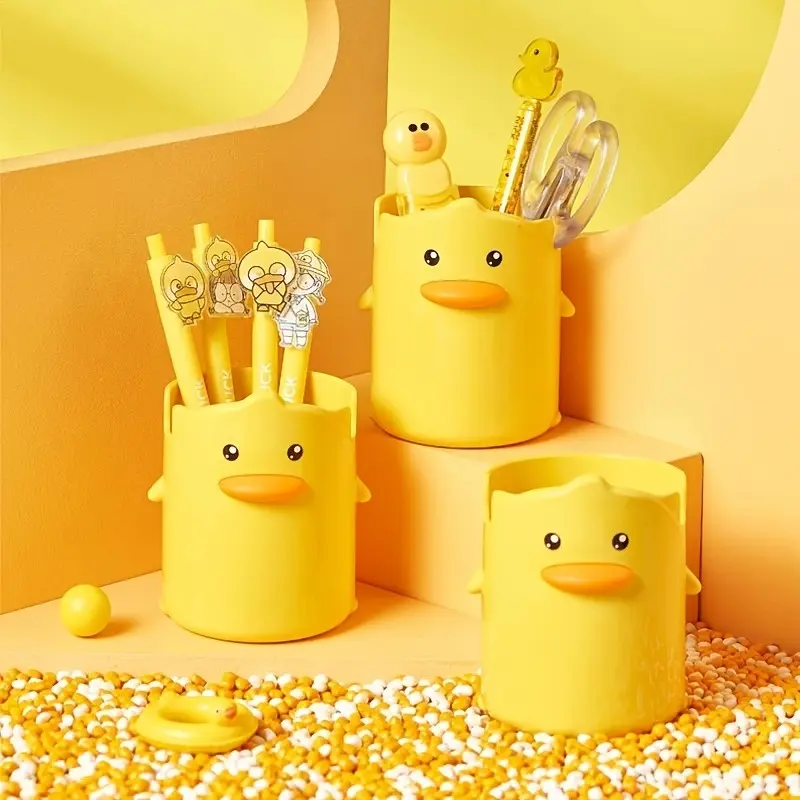 Cartoon cute little yellow duck student pen holder, internet celebrity, creative children's stationery storage box, pen holder, desktop ornament