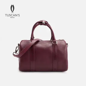 Versatile minimalist women’s bag for commuting—can be worn on one shoulder or crossbody, stylish cylindrical handbag that can also be carried by hand.