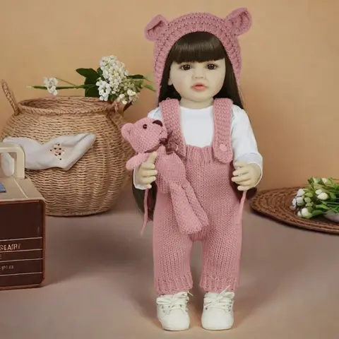 22-inch realistic princess doll with brown long hair and a pink jumpsuit – silicone doll, fully articulated girl with teddy bear and accessories, suitable as a Christmas gift, birthday present, and for collectors.