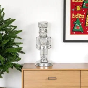 HomeRoots 634486 6 in. Silver Cast Iron Christmas Nutcracker Hand Painted Figurine