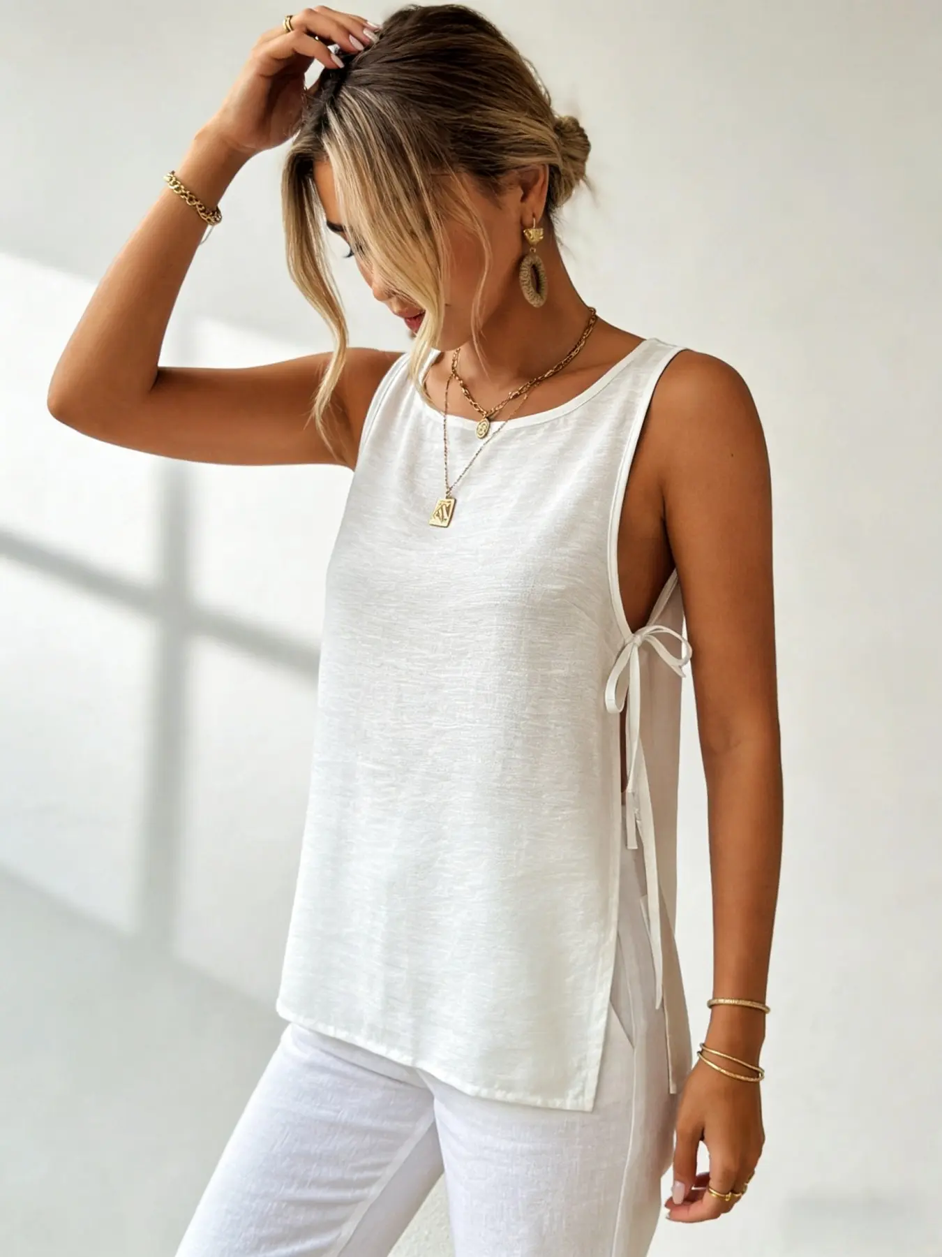 French Effortless White Side Split Tie Waist Sleeveless Top Minimalist White Side Tie Loose Sleeveless Tank Top Elegant Soft White Side Split Tie Sleeveless Blouse
