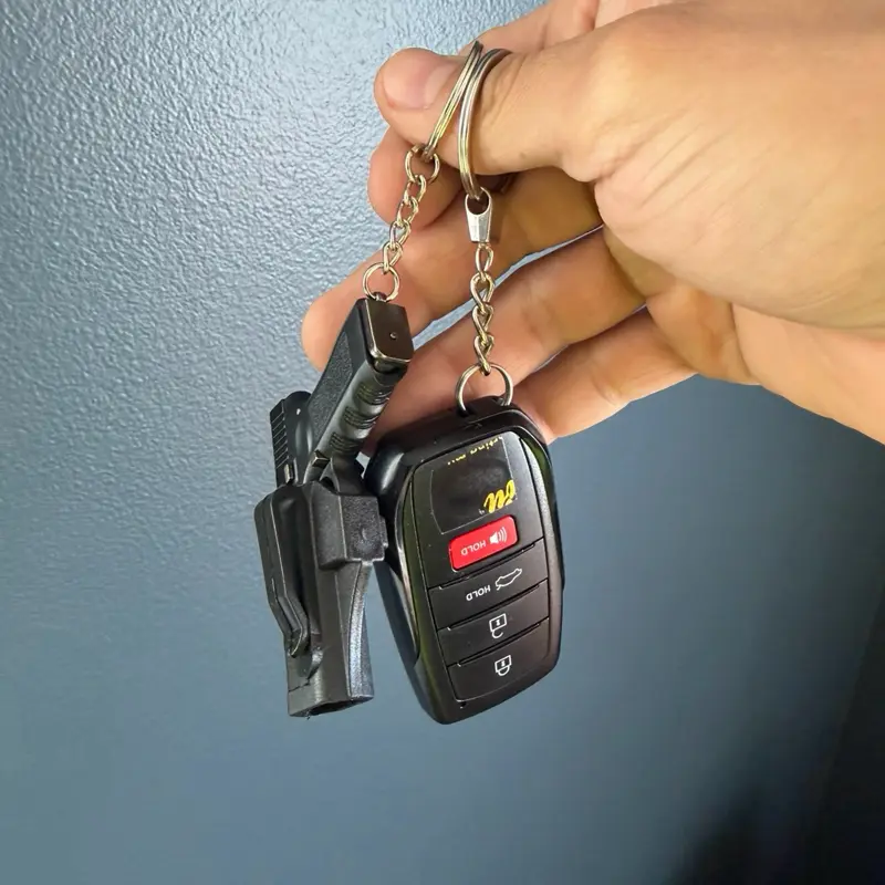 Collectible G-Edition Keychain with Plastic Sleeve and Protective Case