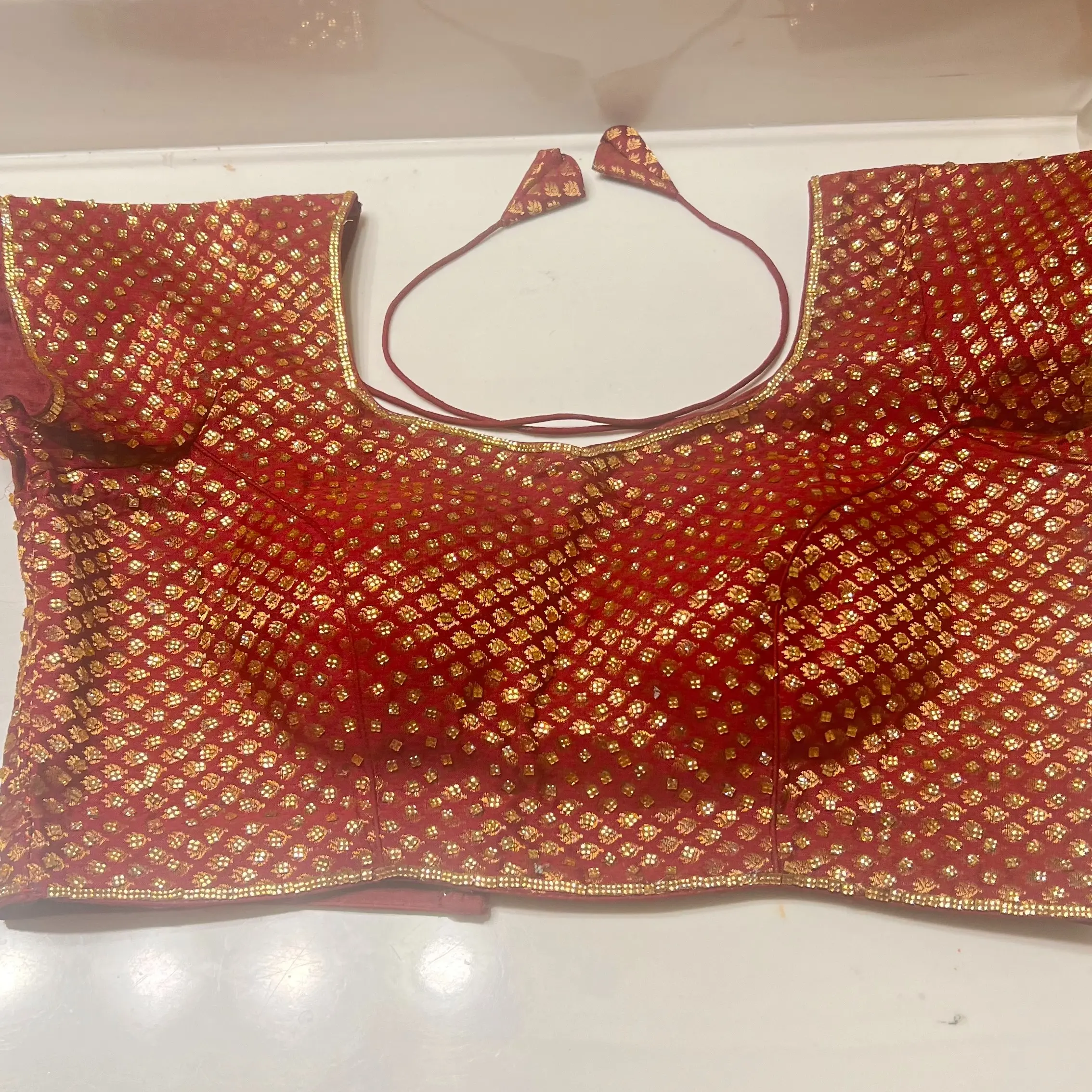 saree blouse  maroon in color with golden stones Dress Traditional