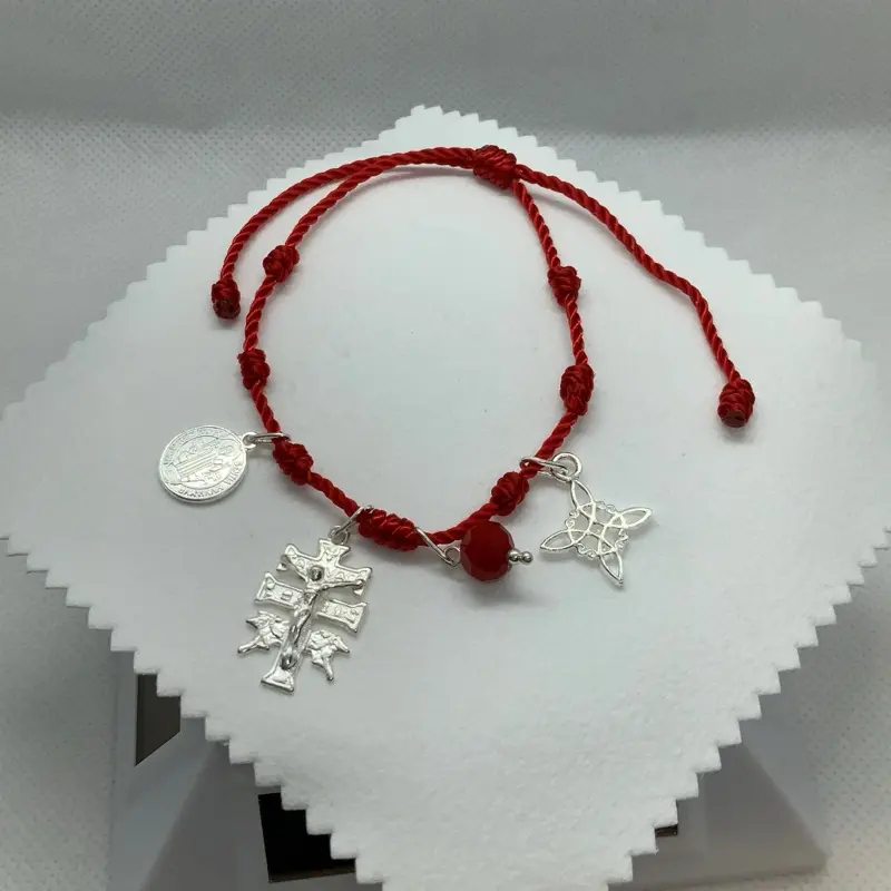 Pulsera de 7 nudos con dijes de plata .925