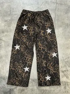 Unisex street style leopard print cross-stitch star embroidery pants with relaxed fit, adjustable drawstring waistband, comfortable Casual Trendy Versatile. Perfect for daily wear, stylish leopard print attire suitable for hip-hop