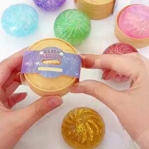 1 Mystery Color Glitter Dumpling Fidget Toy for Stress Relief Fun Engaging Easy to Hold Versatile On-the-Go Use Ideal for All. 5.3cm x4.5cm Filled with Beads.