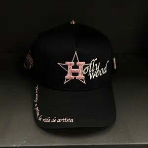 Hollywood Black Cap with Pink Rhinestone Star and Embroidered Text for Artistic Lifestyle