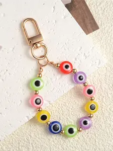 A stylish retro ethnic-style demon's eye bead keychain, perfect for daily wear, vacations, dates, and other occasions, also serving as a delightful and exquisite small gift.
