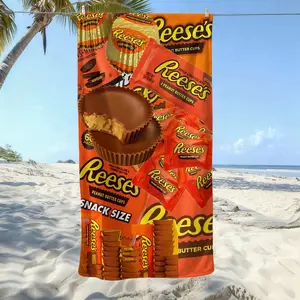 This Reese's Peanut Butter Cups beach towel, soft texture, beach blanket, is a soft and lightweight sand blanket for travel, swimming pool, surfing, yoga, camping, travel towels, personalized towels. Is Christmas, Holidays, Birthdays, Halloween