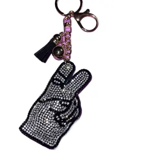 Peace Hand Bag Charm or Keychain with Rhinestone Embellishments and Tassel Accents for Stylish Accessories