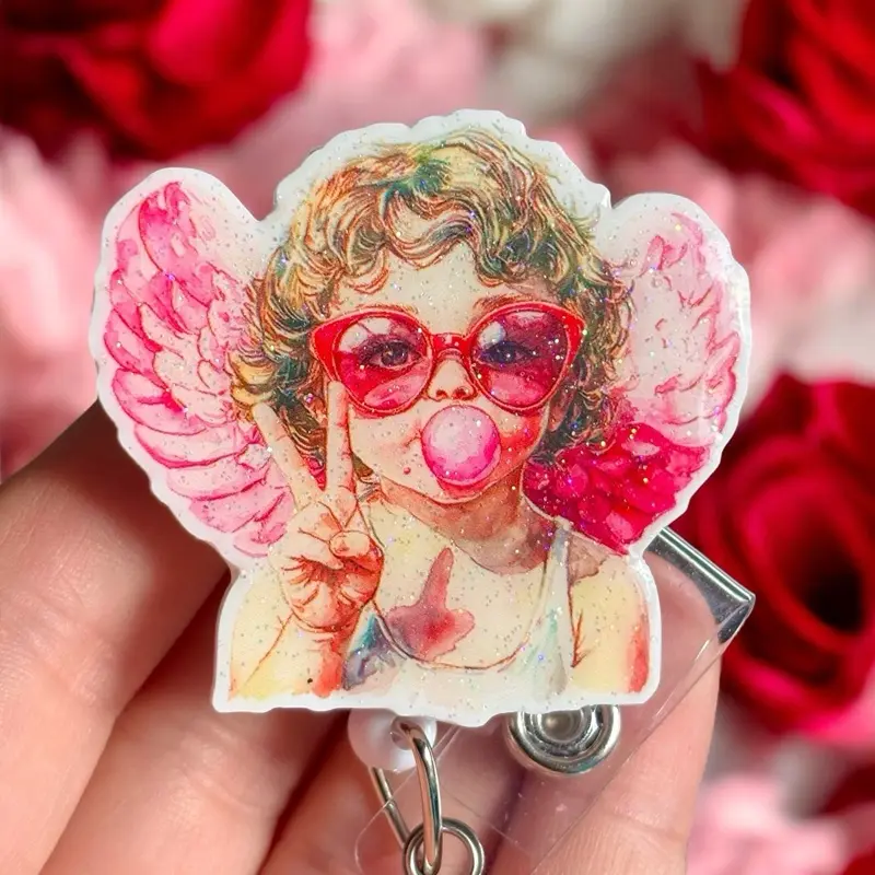 Glitter My Badge Valentine’s Day Cupid badge reel for nurse and hospital workers. Badge clip Badge pull - Retractable swivel clip with a 360 rotation. Great gift for coworker.