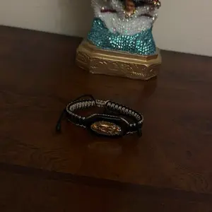 Adjustable Our Lady of Guadalupe Bracelet in Black and Beige with Gold-Tone Centerpiece Elegant Design