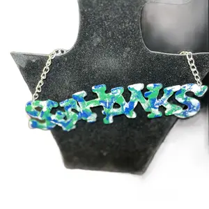 Sea and a Hawk Necklace with Colorful Lettering and Decorative Design