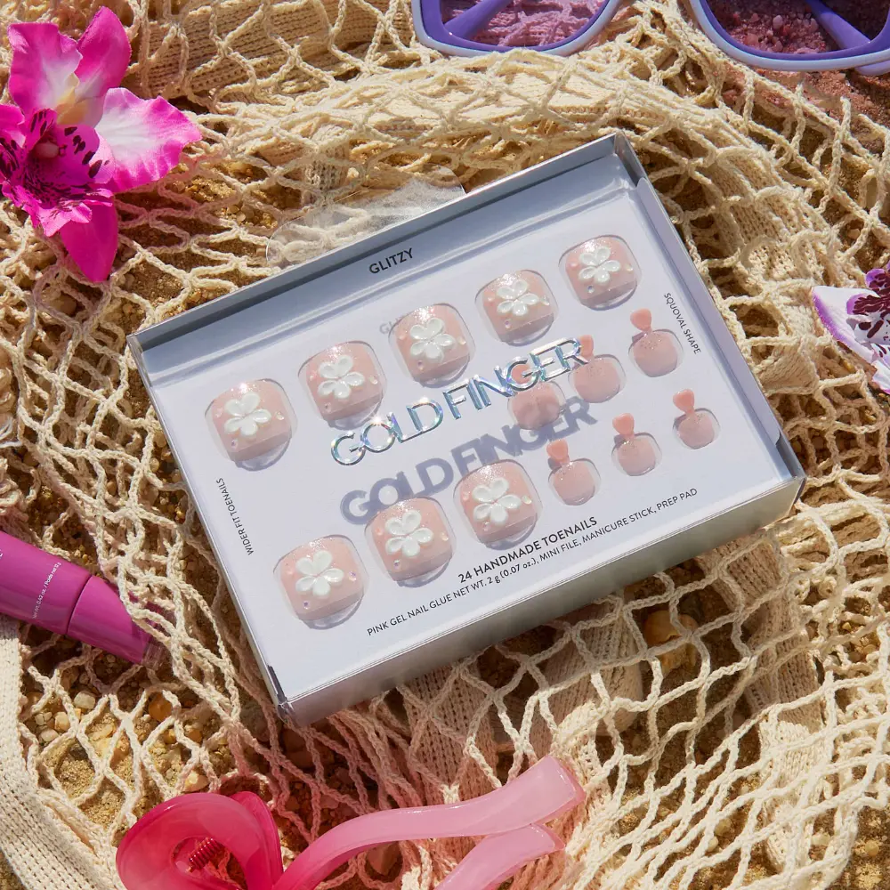 Gold Finger Glitzy 3D Press-On Toenails in Sterling – Squoval Fake Toes, Clear Glitter with 3D White Flower, Luxury Glue On Pedicure, Wider Fit 24 Pc Kit
