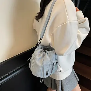 Casual INS Style Drawstring Crossbody Bag for Students, Lightweight Nylon Shoulder Bag with Mesh Side Pocket & Adjustable Strap, Breathable Multi-Purpose Bag for Makeup Storage & Daily Use