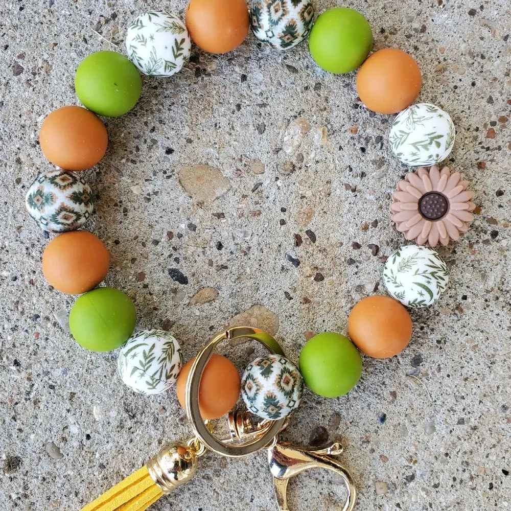 Fall Floral Bangle Keychain with Tassel with suede tassel for fall lovers! Silicone material, hand washable