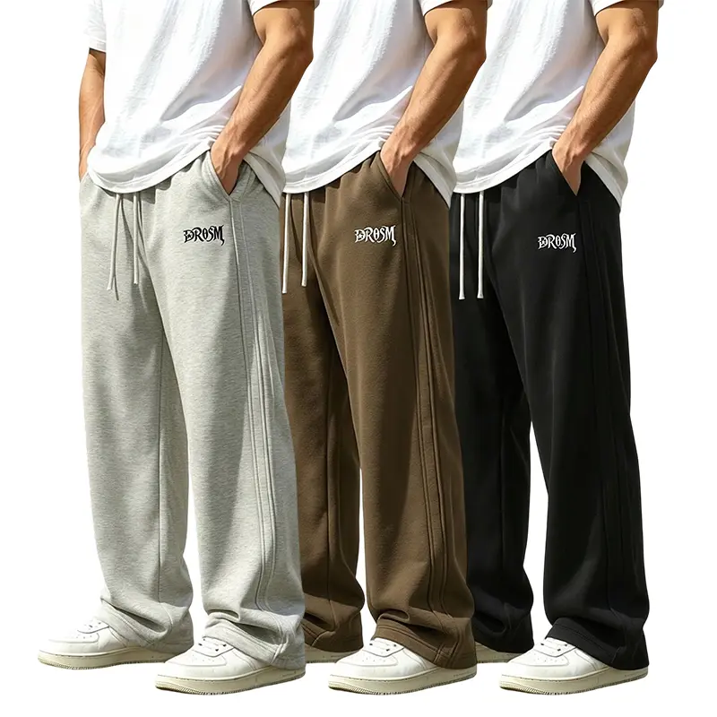 Korean-style trendy athletic sweatpants featuring retro English embroidery accents on the pant body and a side seam design with three lines for added texture; an elastic drawstring waistband allows for easy adjustment, and the fabric is soft and skin-frie