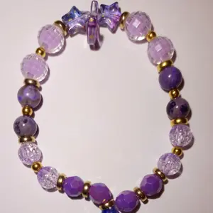 Starlit Bloom Bracelet Dreamy Design with Star-Shaped Beads Crackles & Dangling Flower Charm in Purples Blues and Golds
