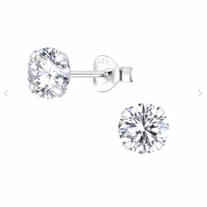 Very demure earrings white crystal, emerald, blue Montana or purple amethyst cubic zirconia set in 925 sterling silver