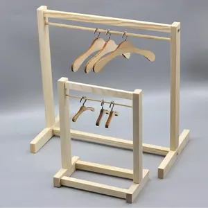 Exquisite Mini Wooden Hanger Display Rack Designed Specifically for Dolls - Perfect for Storing and Displaying Small Clothes