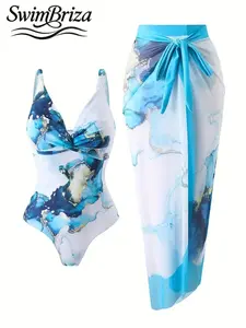 Briza｜Padded V Neck Twist Front One Piece Swimsuit In Blue Marble Print With Sarong Creates Vacation Swimwear For Women As A Swimsuit Cover Up For Women And Bathing Suit Women Set With Tummy Control Swimwear For Resort Confidence