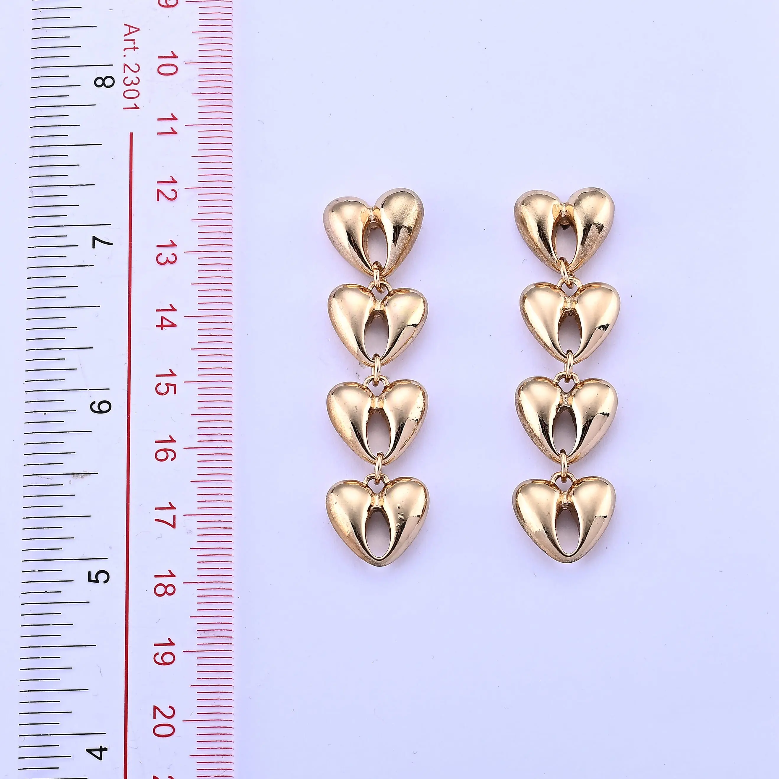 Dangling Heart Earrings in Goldtone