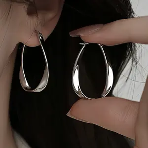Silver Teardrop Hoop Earrings - Sleek Curve Polished Finish Lightweight Design Modern Elegance Secure Clasp Comfortable Versatile Everyday Special Wear