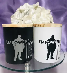 Caleb a fresh scent with the affirmation of empowered.  A double wicked candle.