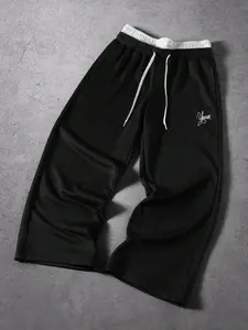 Men’s summer trendy ice silk quick-dry drawstring long pants, American high-street style, lightweight loose athletic pants suitable for running, workouts, and everyday commuting.